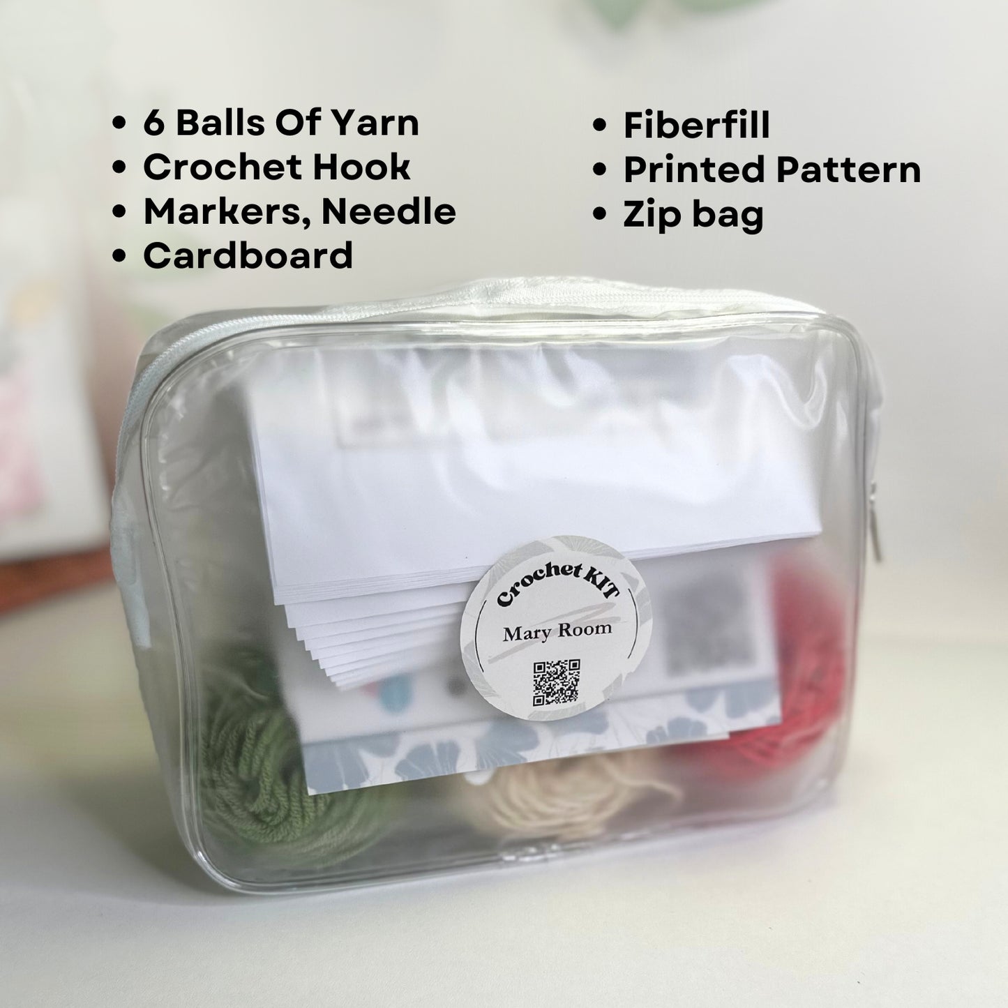 DIY crochet kit packed in clear zippered pouch showing yarn, pattern, hook, and stuffing