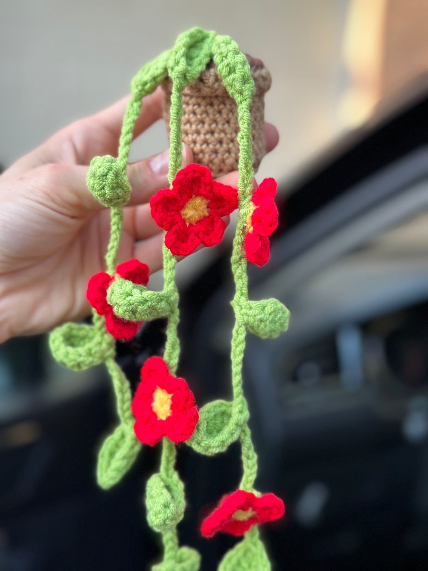 Handmade crochet car vent clip with red flowers and lavender sachet