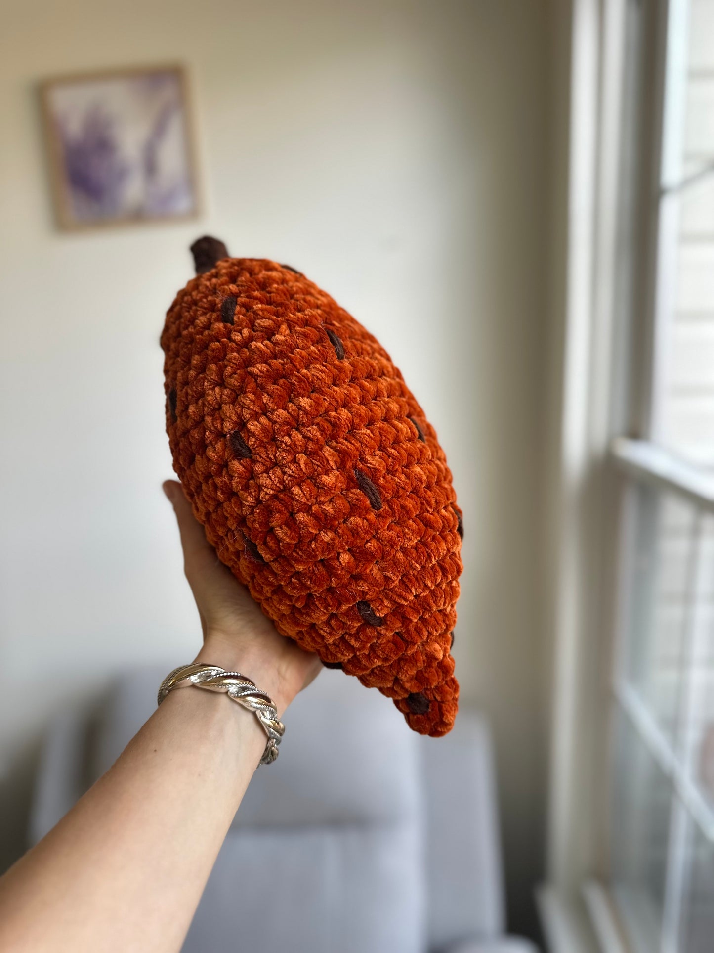 Large crochet yam plushie with realistic texture and soft stuffed design