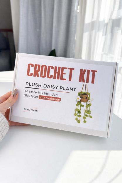 Branded box of the Crochet KIT Plush Plant with Daisy Flowers, designed for gifting.