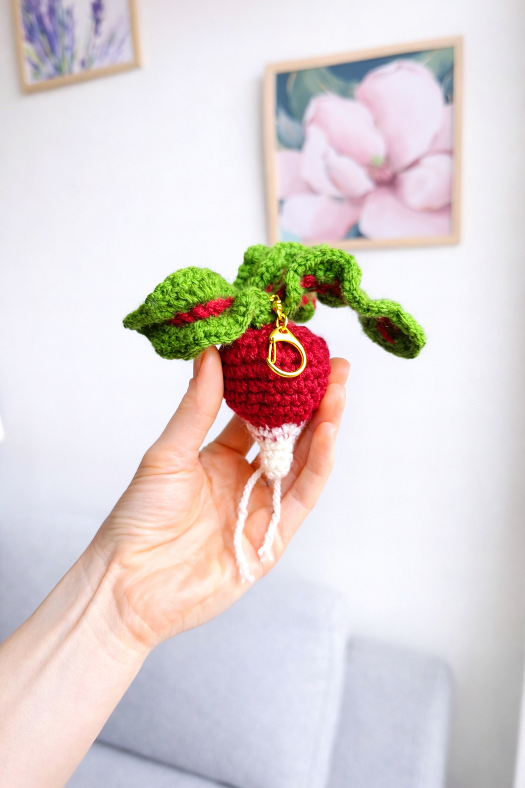 Crochet radish bag charm with pink and white root vegetable design, handmade keychain gift