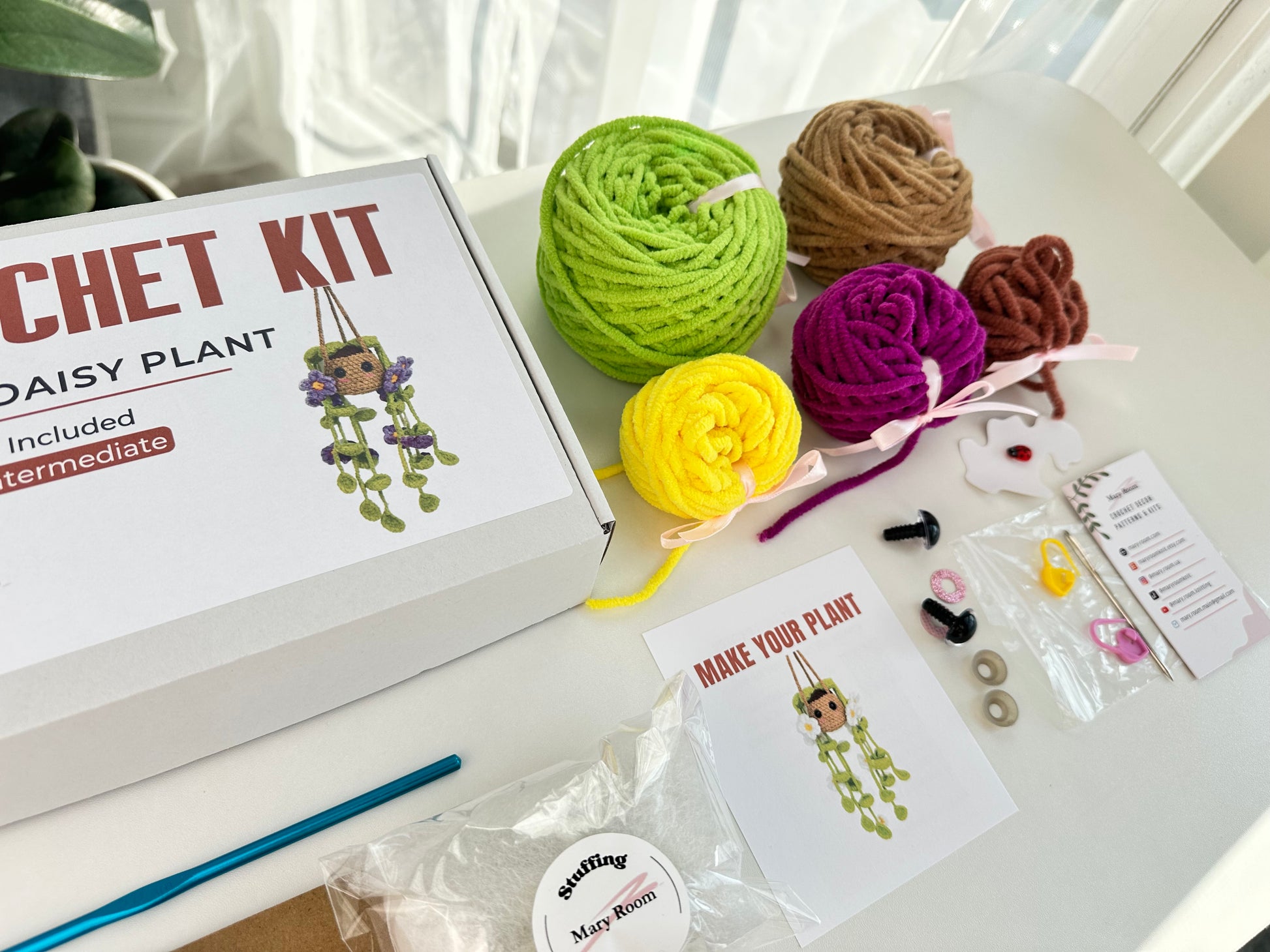Workspace setup with the Crochet KIT Plush Plant with Daisy Flowers — ideal for beginner crafters.