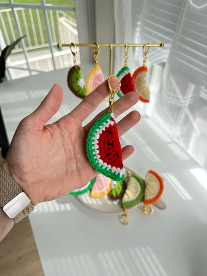 Handmade fruit slice bag charms featuring kiwi, lemon, orange, grapefruit, and watermelon
