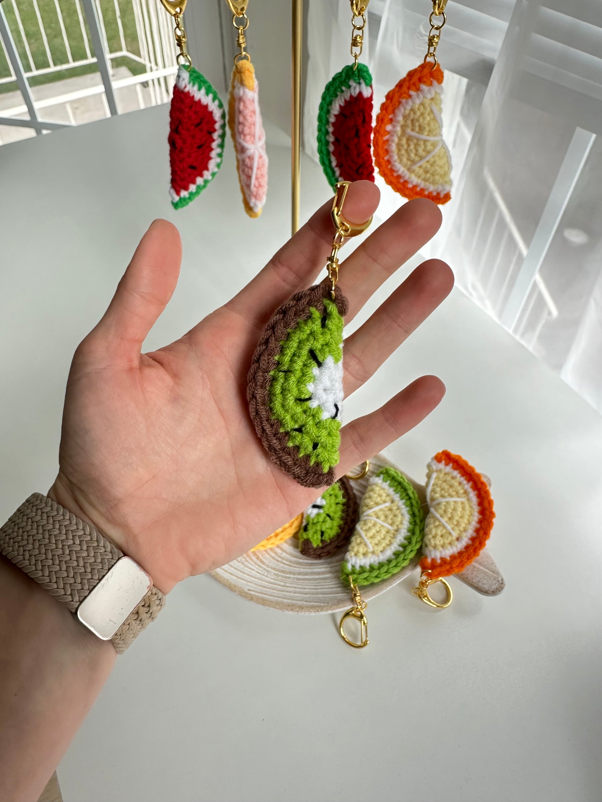 Cute crochet fruit keychain set with bright summer colors
