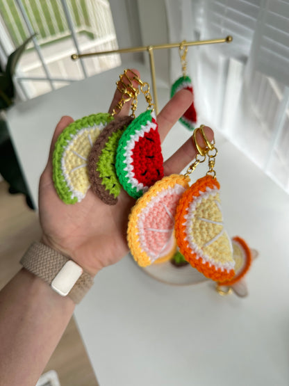 Colorful fruit slice crochet accessories made with soft acrylic yarn
