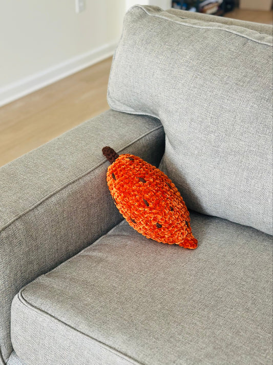 Handmade crochet sweet potato plush toy made from soft plush yarn with fiberfill stuffing