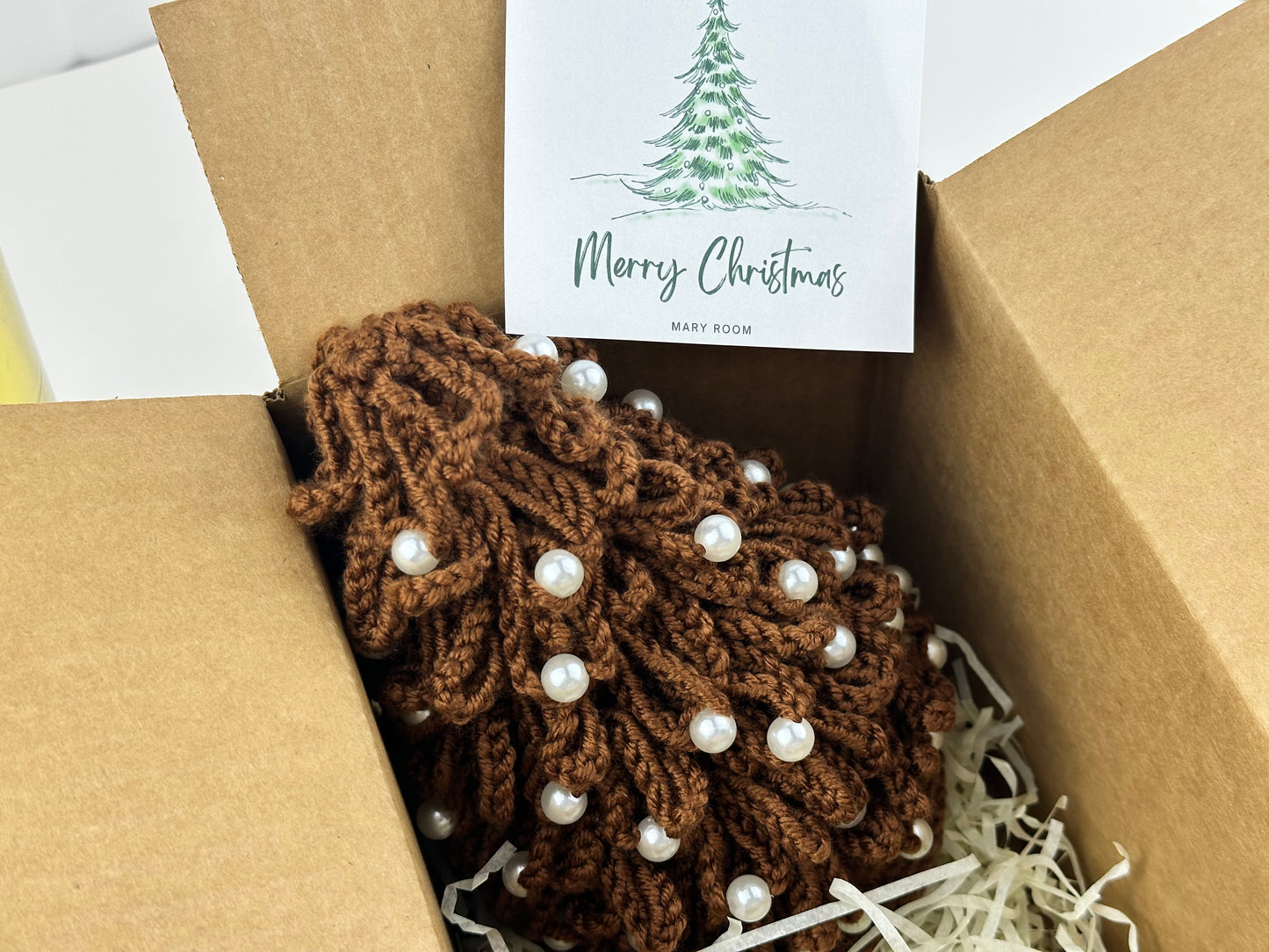 Crochet Christmas tree gift boxed with a Merry Christmas card and tissue paper
