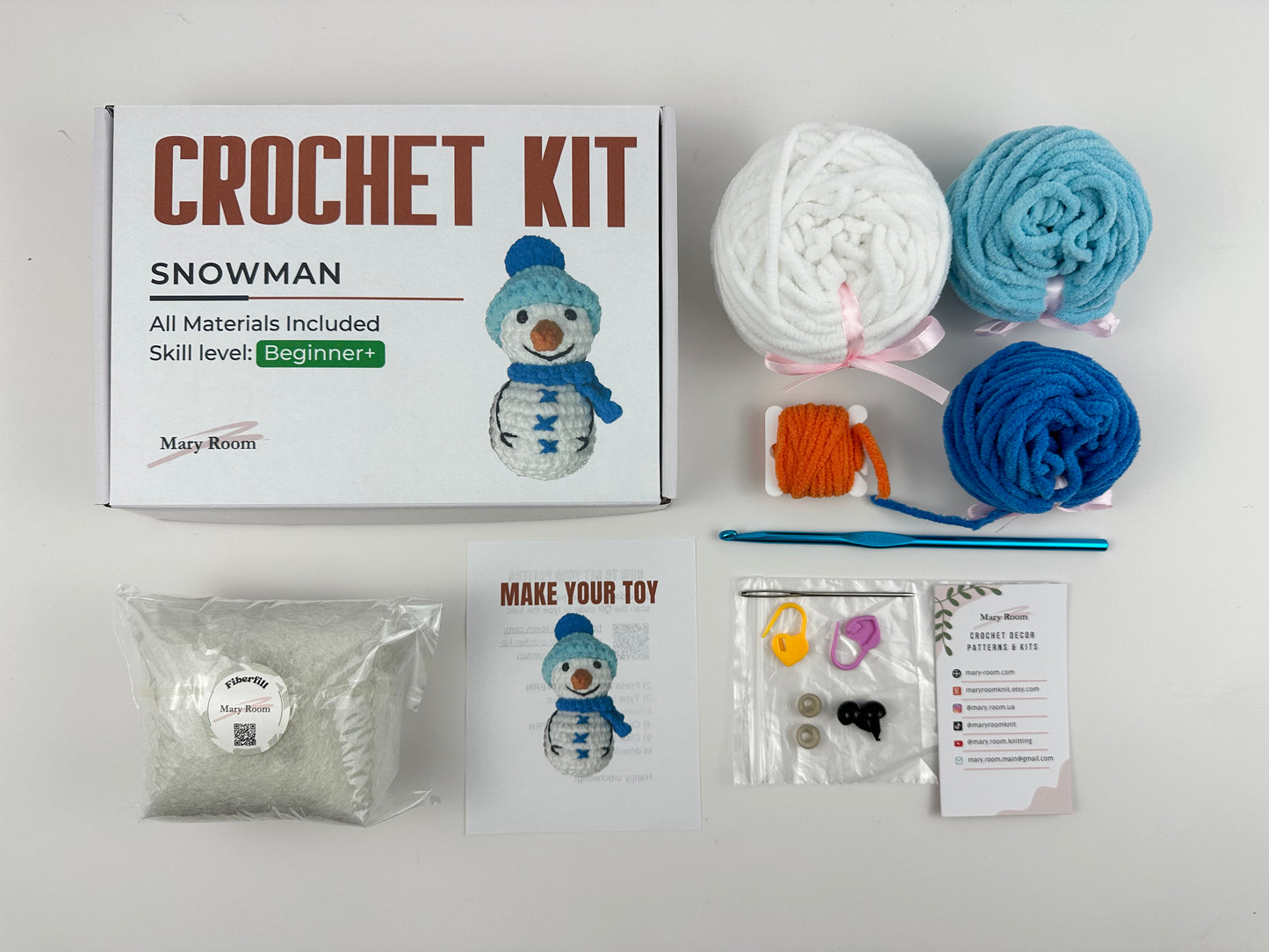 Crochet snowman kit with detailed instructions and materials included