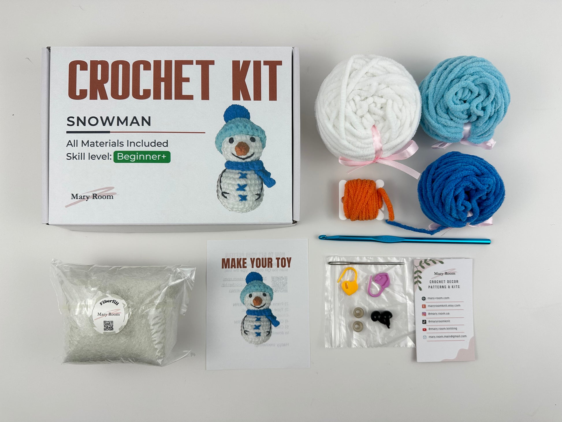 Crochet snowman kit with detailed instructions and materials included