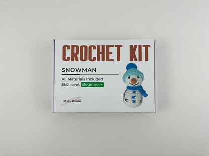 Snowman amigurumi crafting kit with soft yarn and festive details