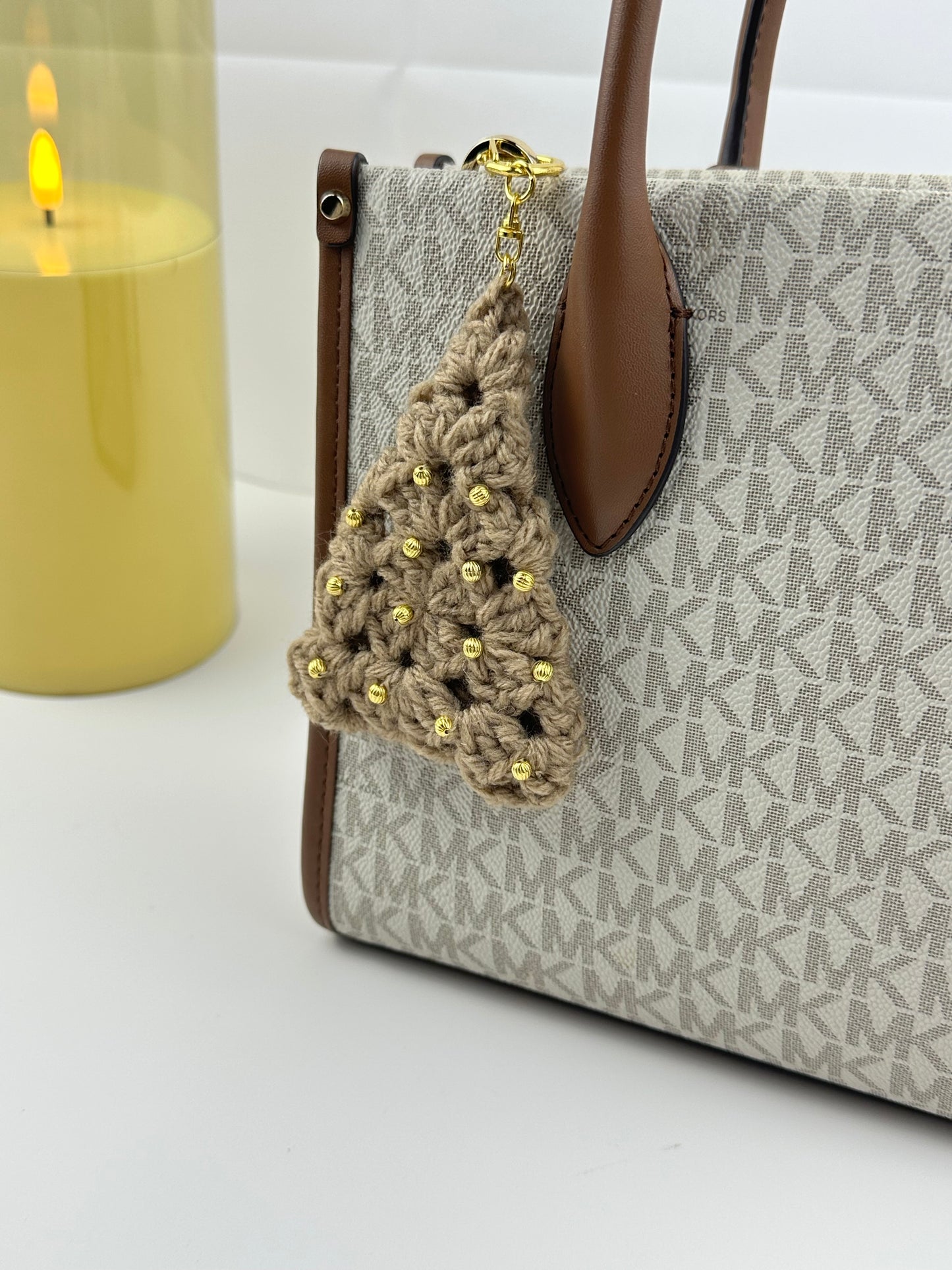 Cute festive Christmas tree keychain made from acrylic yarn