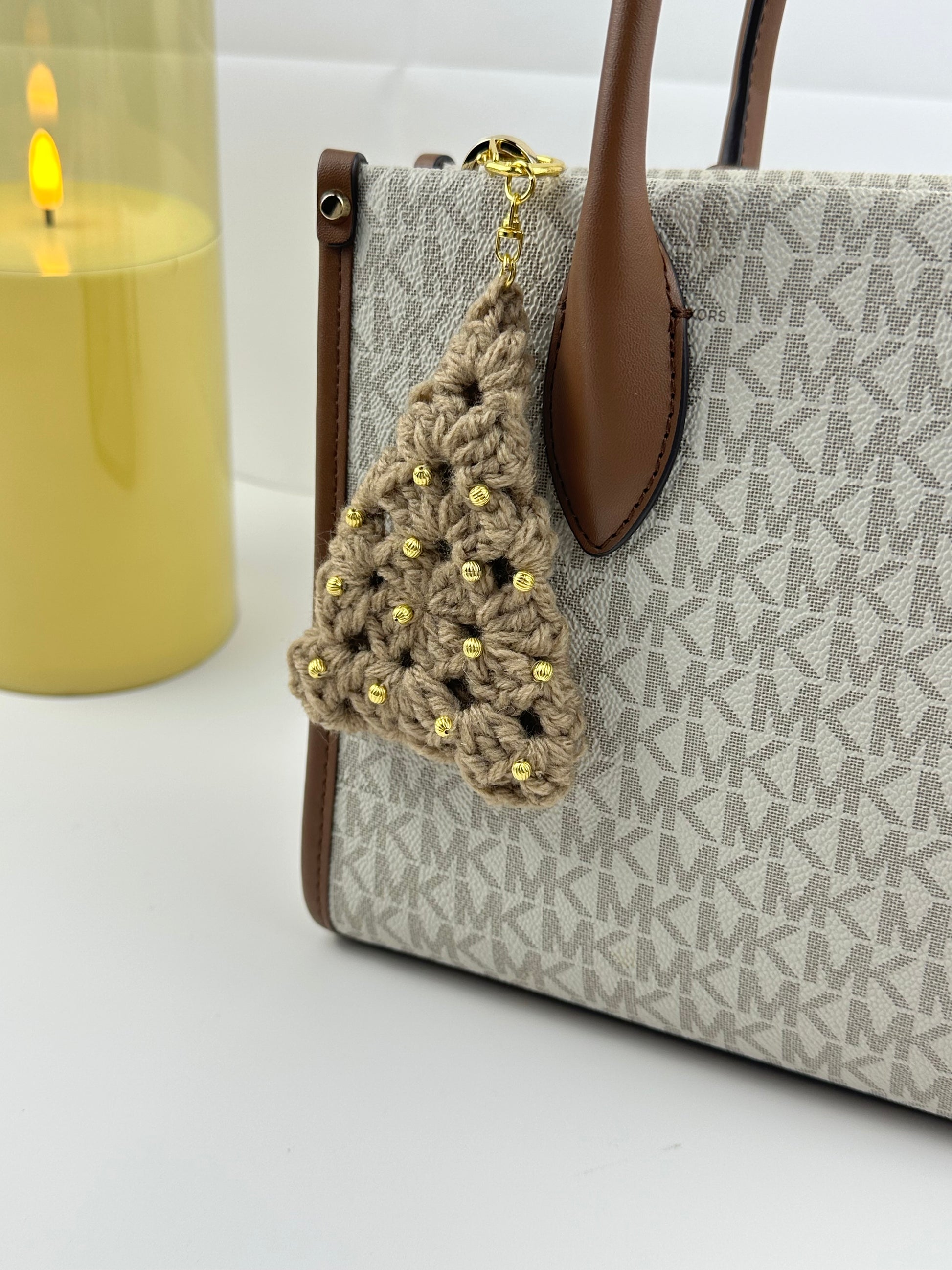 Cute festive Christmas tree keychain made from acrylic yarn