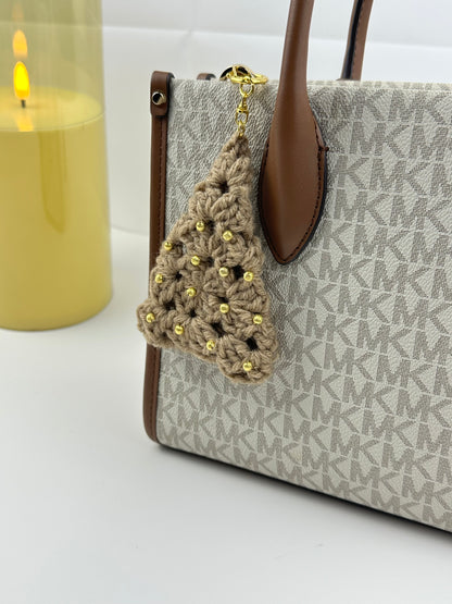 Cute festive Christmas tree keychain made from acrylic yarn