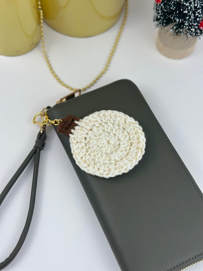 Sparkly white crochet Christmas ball charm for keys, bags, or backpacks.