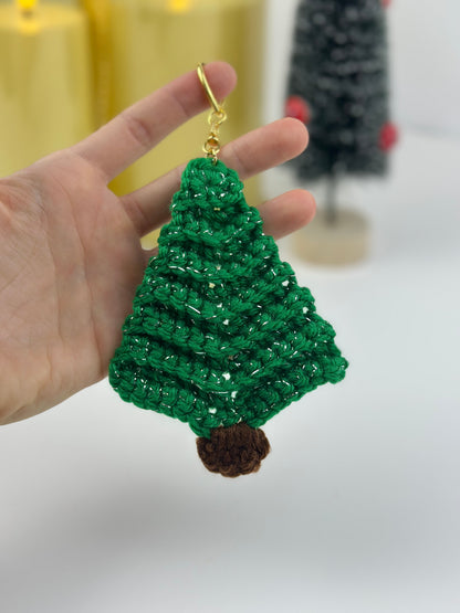 Cute handmade Christmas tree bag charm crafted from sparkly green yarn