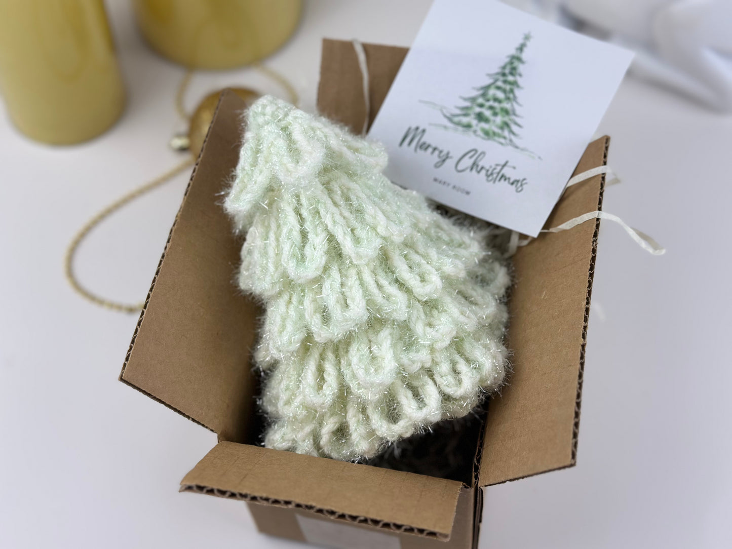 Handmade white crochet Christmas tree made with soft fluffy yarn.