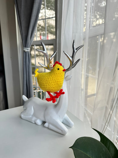 Cute crochet chicken keychain shown in a gift box for presentation