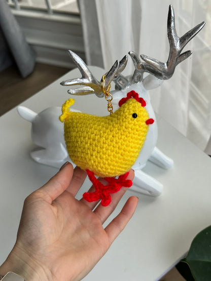 Crochet chicken plush keychain with plastic safety eyes and fiberfill stuffing