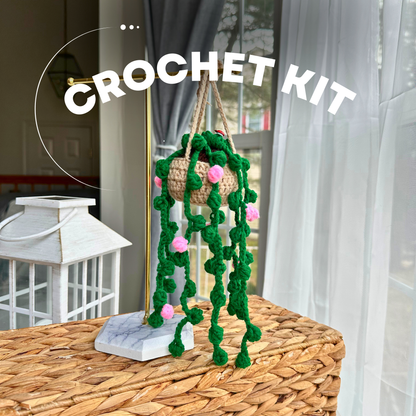 Crochet string of pearls decorative plant on a table with 'CROCHET KIT' text overlay