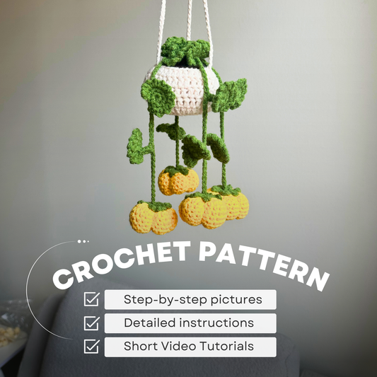 Crochet hanging pumpkin plant pattern – handmade Halloween amigurumi home decor idea with step-by-step instructions.