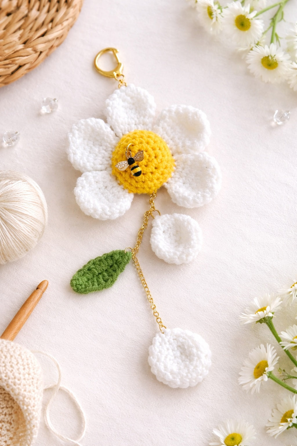 Crochet daisy purse charm with bee accent, soft handmade flower keychain for spring accessories