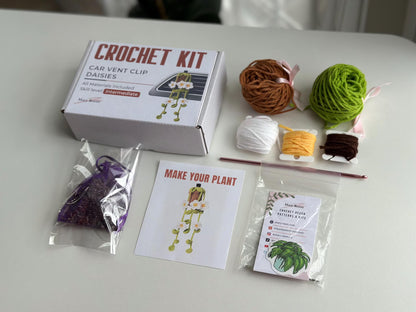 Closed crochet kit box with daisy label and gift-ready sticker